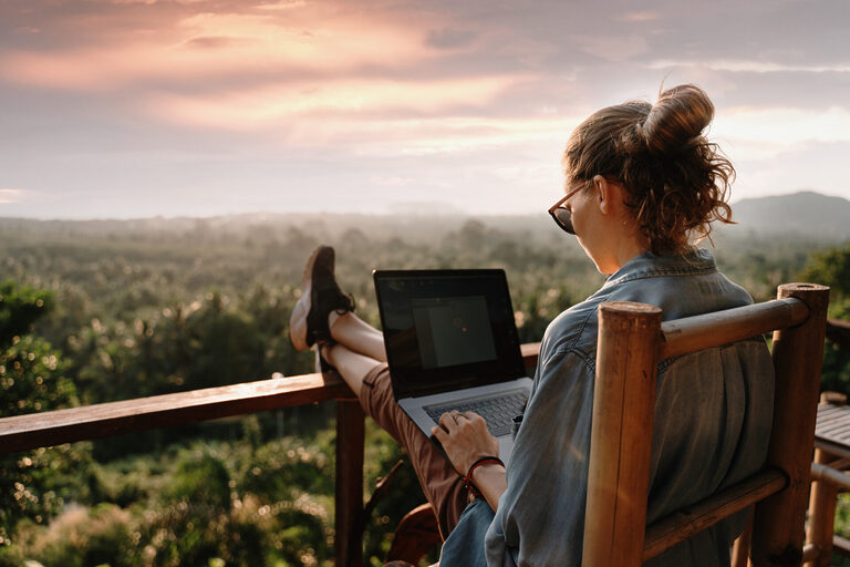 Young business woman working at the computer.