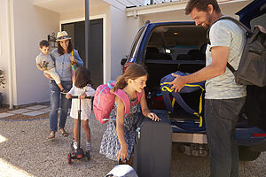 Family Packing Car Ready For Summer Holiday | Tasman Holiday Parks
