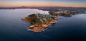 Dawn aerial panorama of the coastal town of Eden, NSW Australia | Tasman Holiday Parks Merimbula