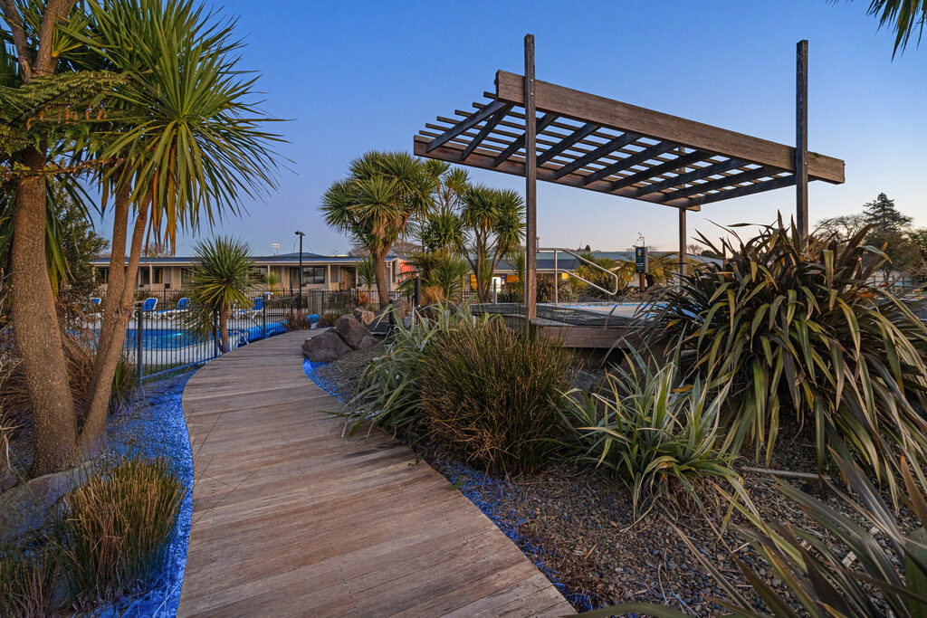 Thermal pool at dusk at Tasman Holiday Parks - Rotorua