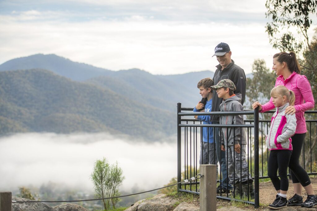 Family standing at lookout | Tasman Holiday Parks Bright