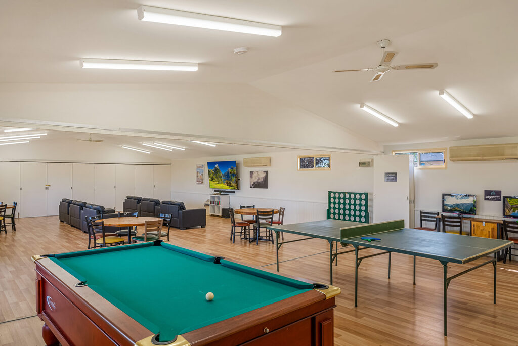 Games room with pool table, table tennis and lounges to relax | Tasman Holiday Parks Bendigo