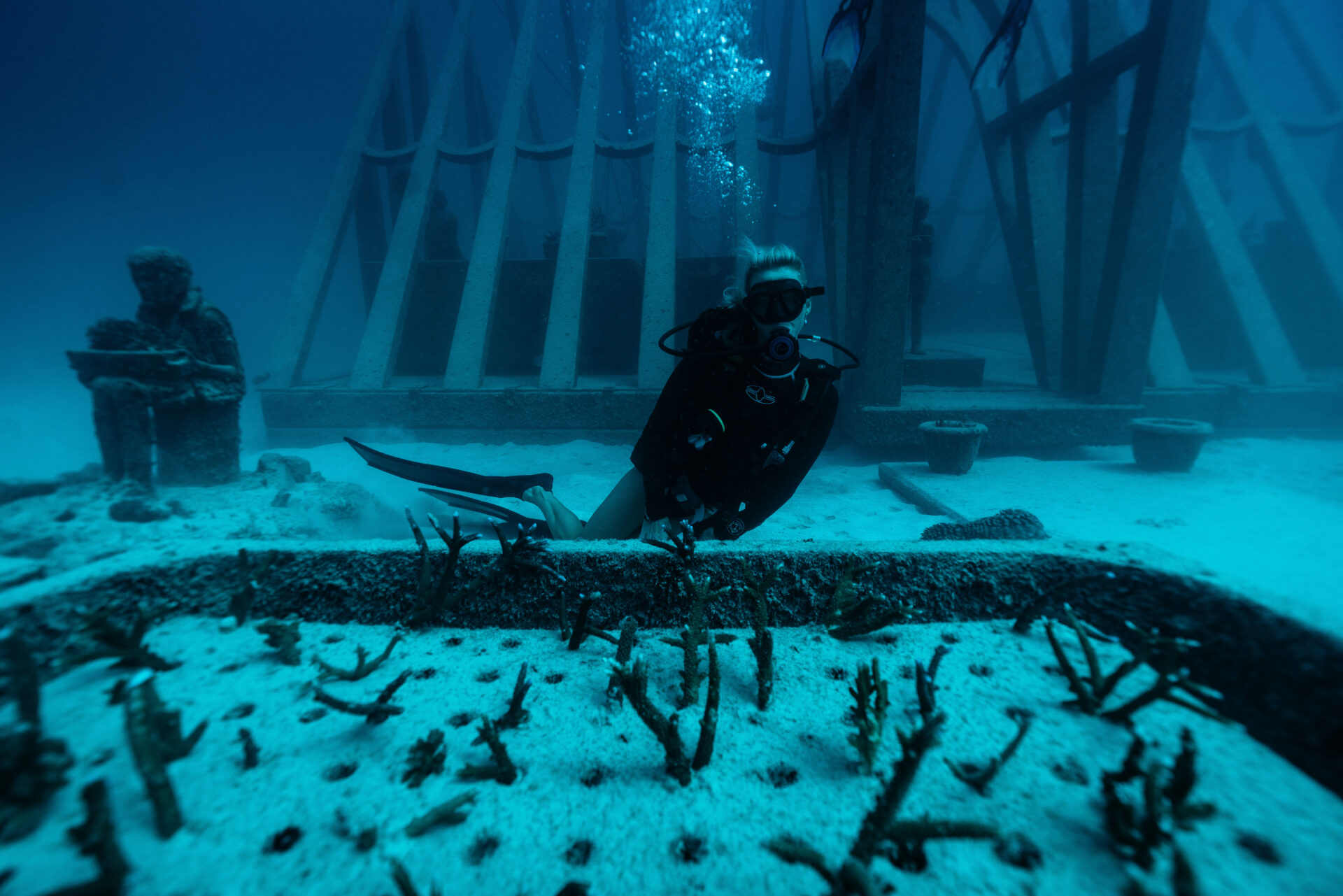 Diving through the Museum of Underwater Art (MOUA)