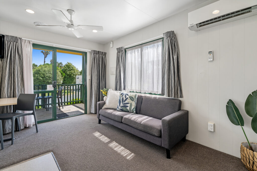 Living room of One Bedroom Chalet | Tasman Holiday Parks Miranda