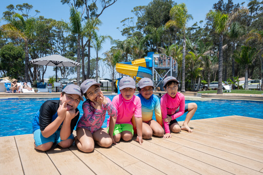 Racecourse Beach pool with kids smiling