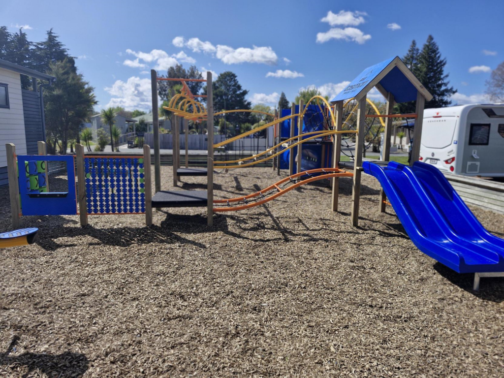 A new playground featuring an exciting slide and a thrilling slide.